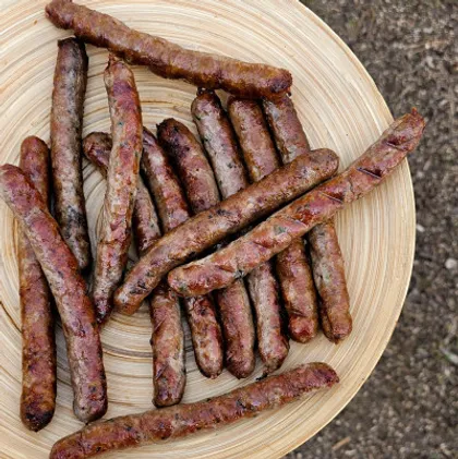 Колбаски мясные с зеленью